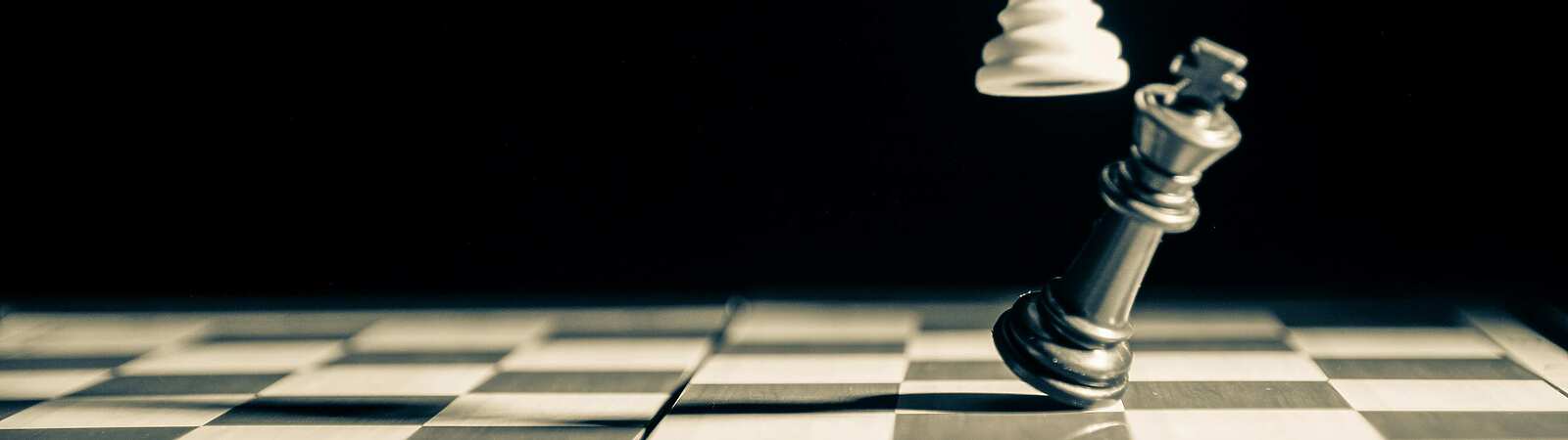 black and white chess board with pieces