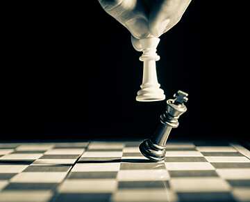 black and white chess board with pieces